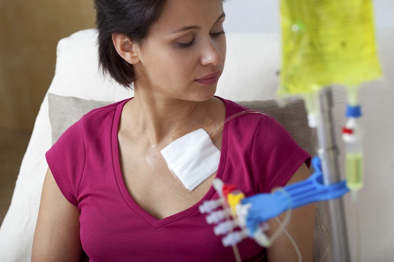 Woman in red shirt undergoing Chemotherapy