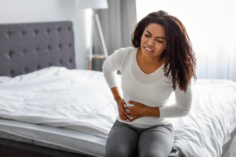 woman having a stomach ache from appendicitis